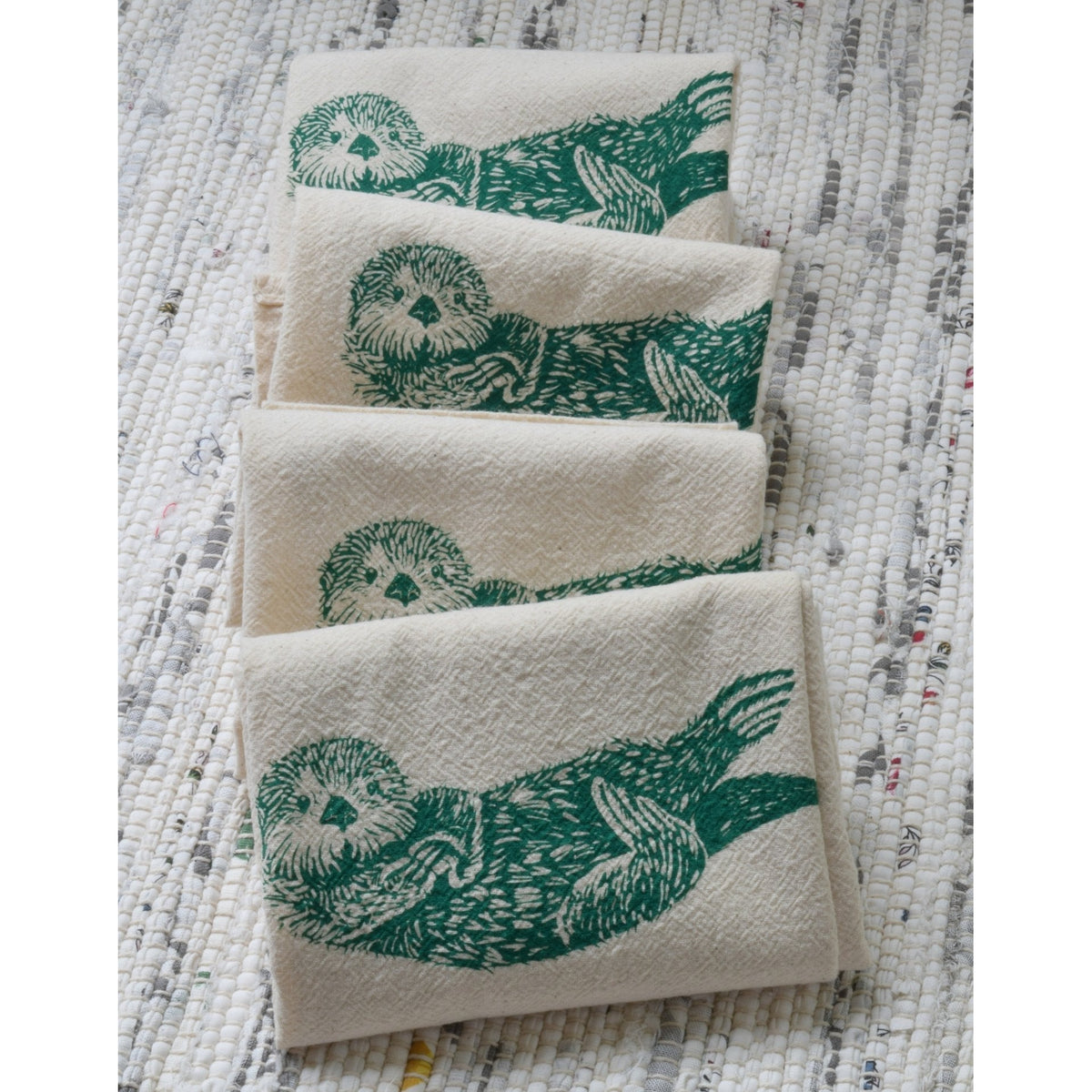 https://modernrascals.ca/cdn/shop/files/organic-otter-cloth-napkins-set-of-4-green-hearth-and-harrow_1200x.jpg?v=1683403348